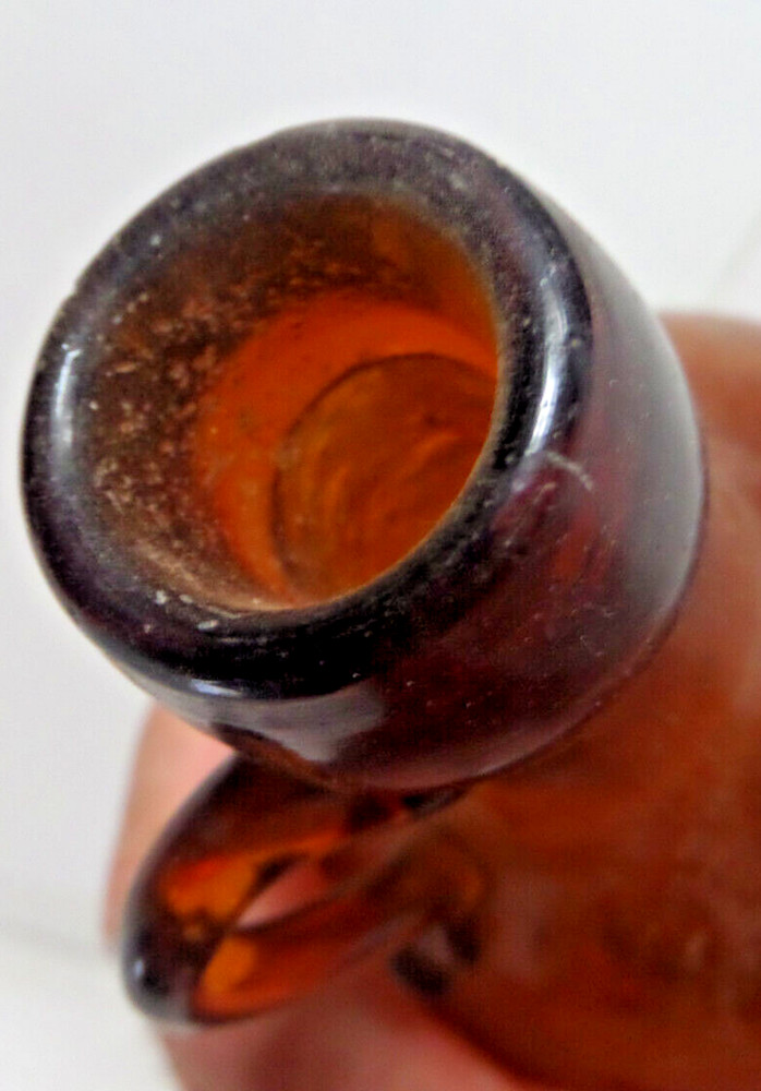 brown glass bottle applied handle antique EMPTY