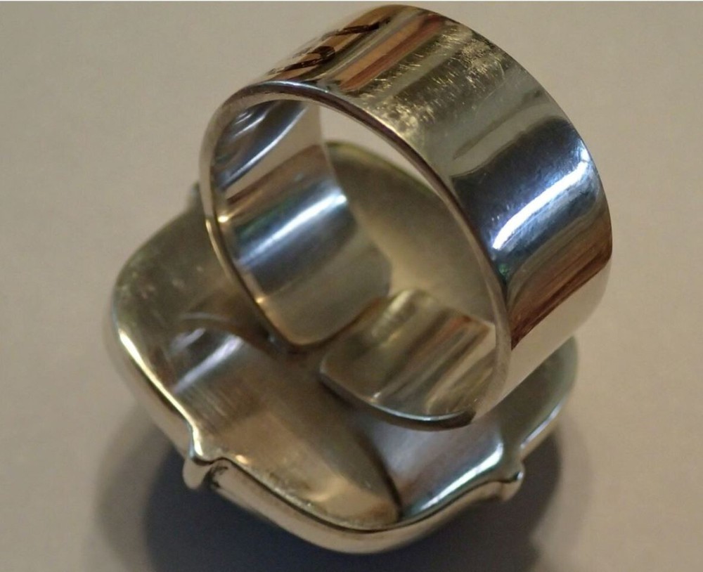 Sterling Silver Ring with Lapis carved Face. adjustable