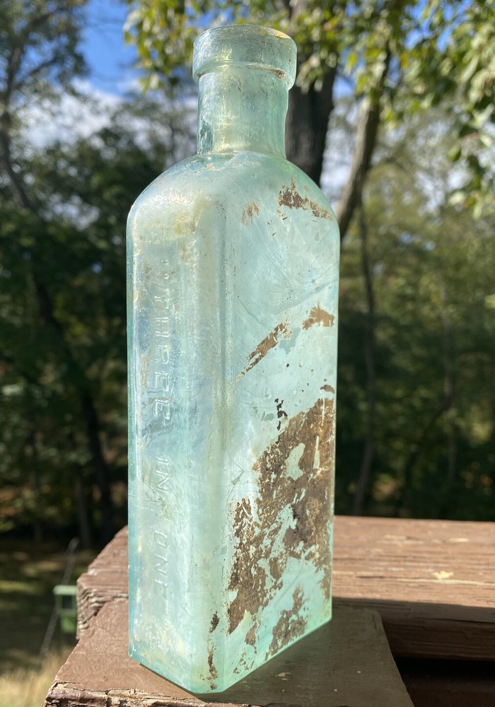 Three In One Oil Co, Blown Aqua Bottle
