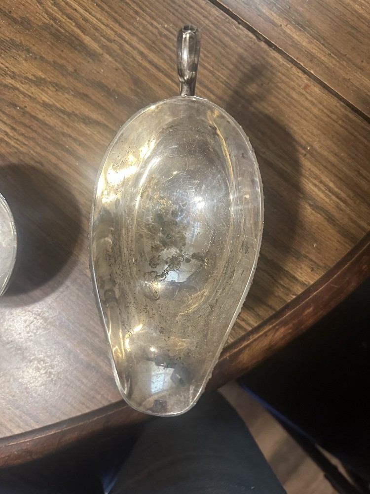 Set Of Four Silver Plated Cups.