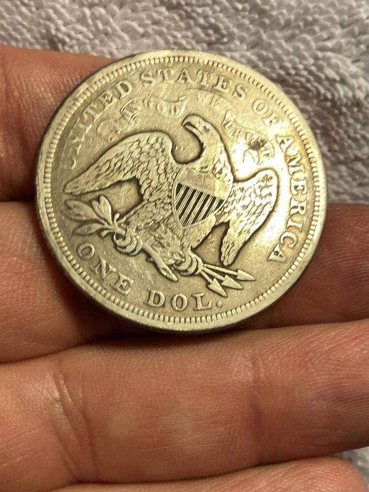 1871 seated liberty dollar