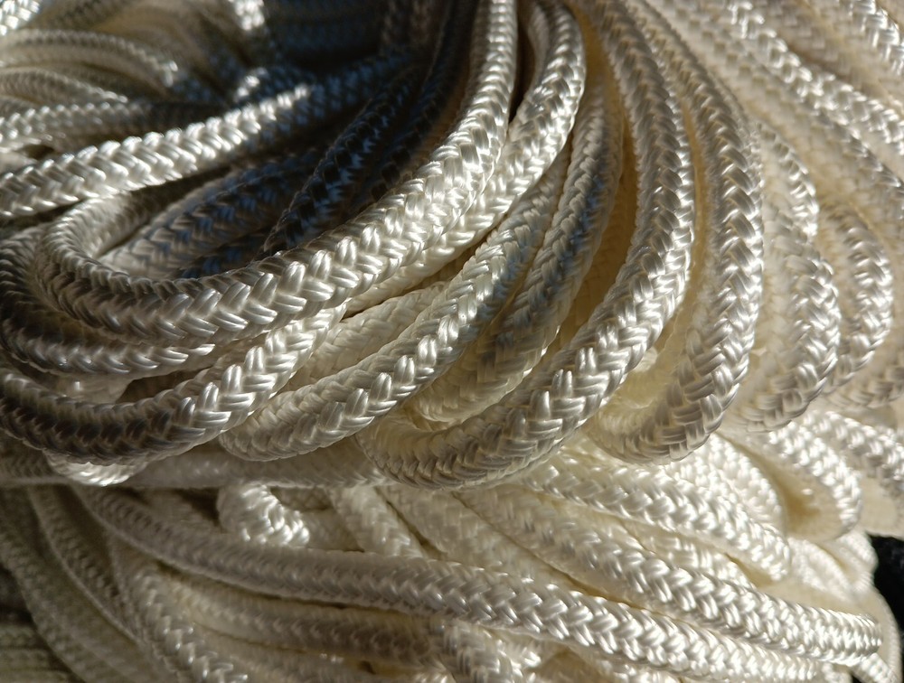 5/16 x 61 ft Pre-Cut Double Braid Polyester rope hank. White.