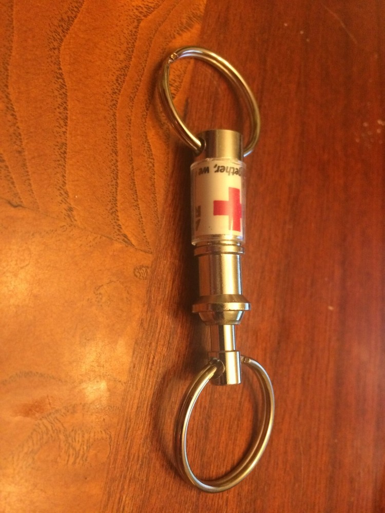 Red Cross key chain. Functional nice Take a look!
