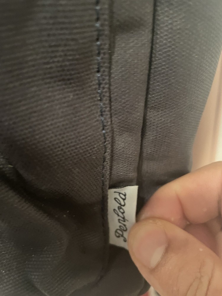 Penfold Heritage Backpack" and "USGA 1894 Shield"