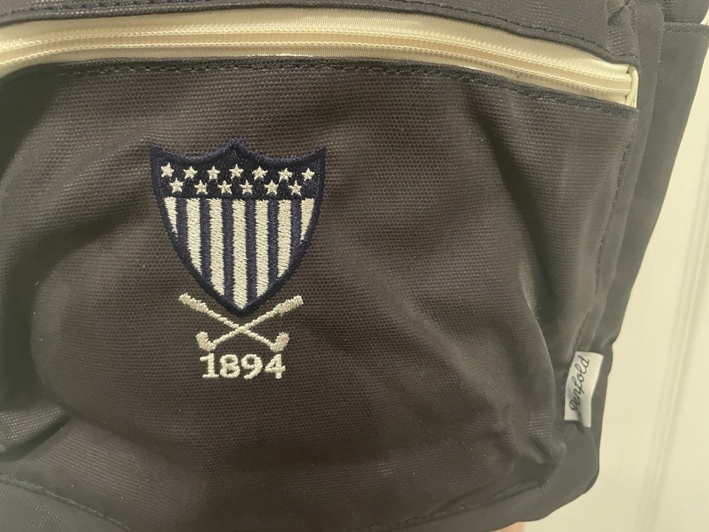 Penfold Heritage Backpack" and "USGA 1894 Shield"
