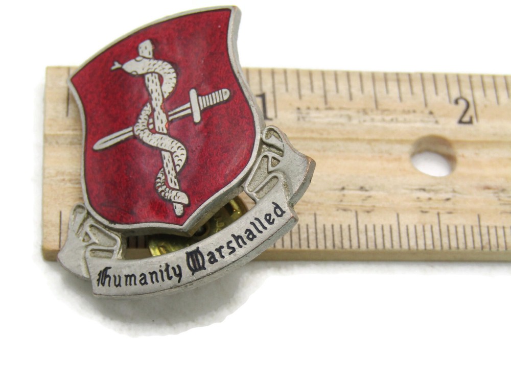 Humanity Marshalled Red Crest Pin Silver Tone