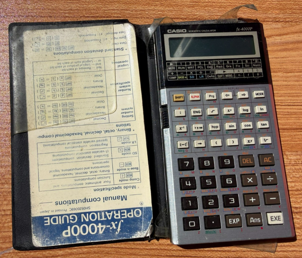 Vintage Casio fx-4000P Programmable Scientific Calculator w/ Operation Guide