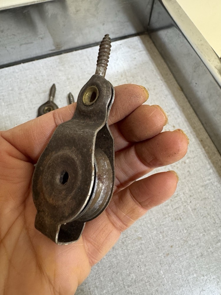 4 vintage small metal block pulleys