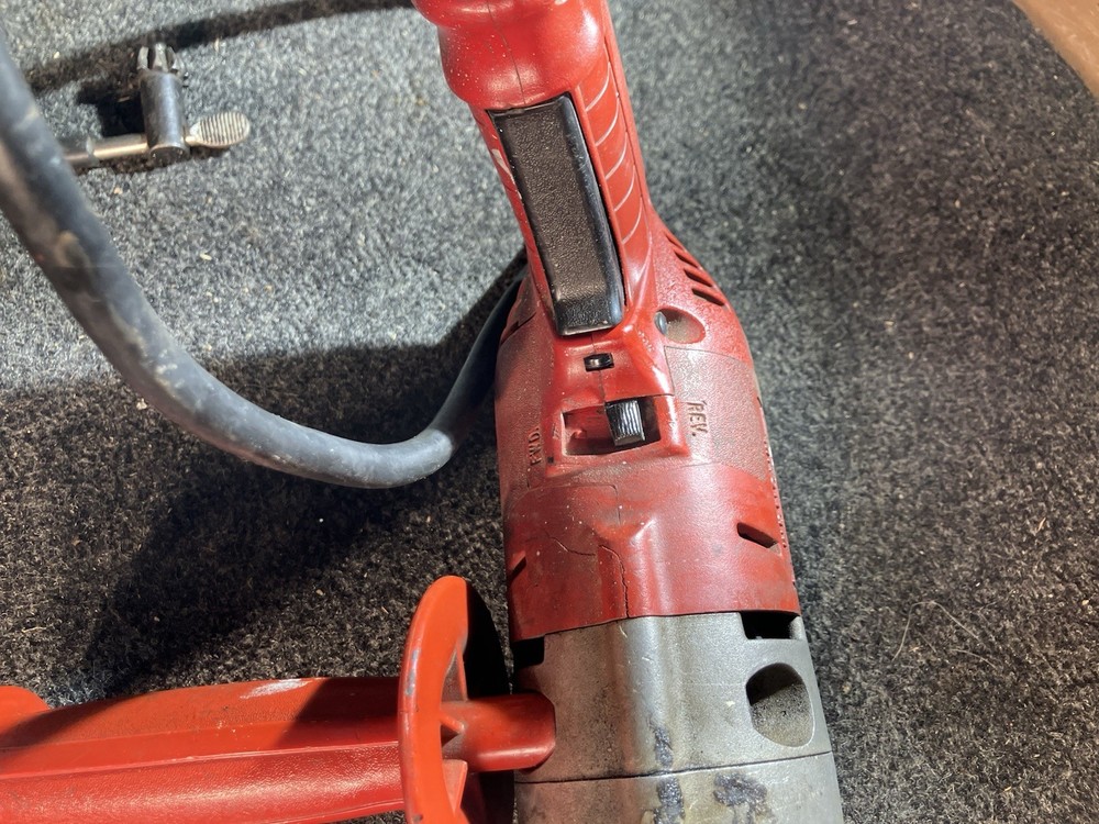 Milwaukee Electric Drill with Side Handle Attachment