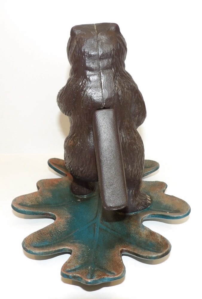 WONDERFUL M.I. CAST IRON BEAR STANDING ON LEAF NUTCRACKER