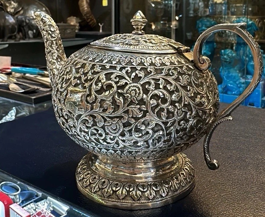 Kutch Indian silver Teapot With Scroll And Rosette Embossing. Circa 1900.