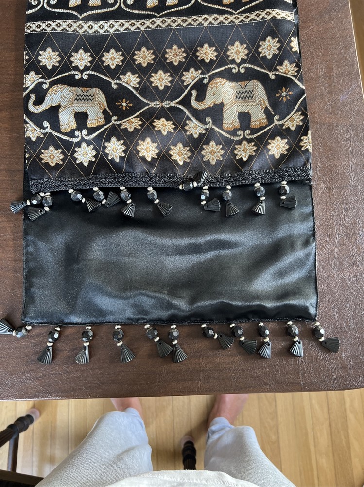 Table Runner With Gold Elephants On Black Backdrop