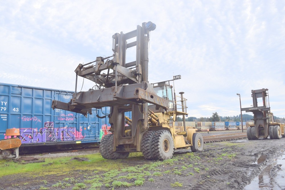 Hyster H 1050 E forklift with, container handler Attachment, Cummins M-11,