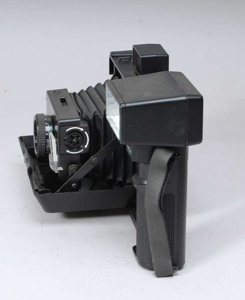 POLAROID PRO-PACK IN THE BOX W CAMERA FLASH STRAP & MANUALS FLASH BAD
