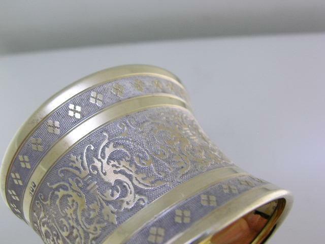 Decorative 800 Silver Napkin Ring w/ gold gilt finish & scroll patterns
