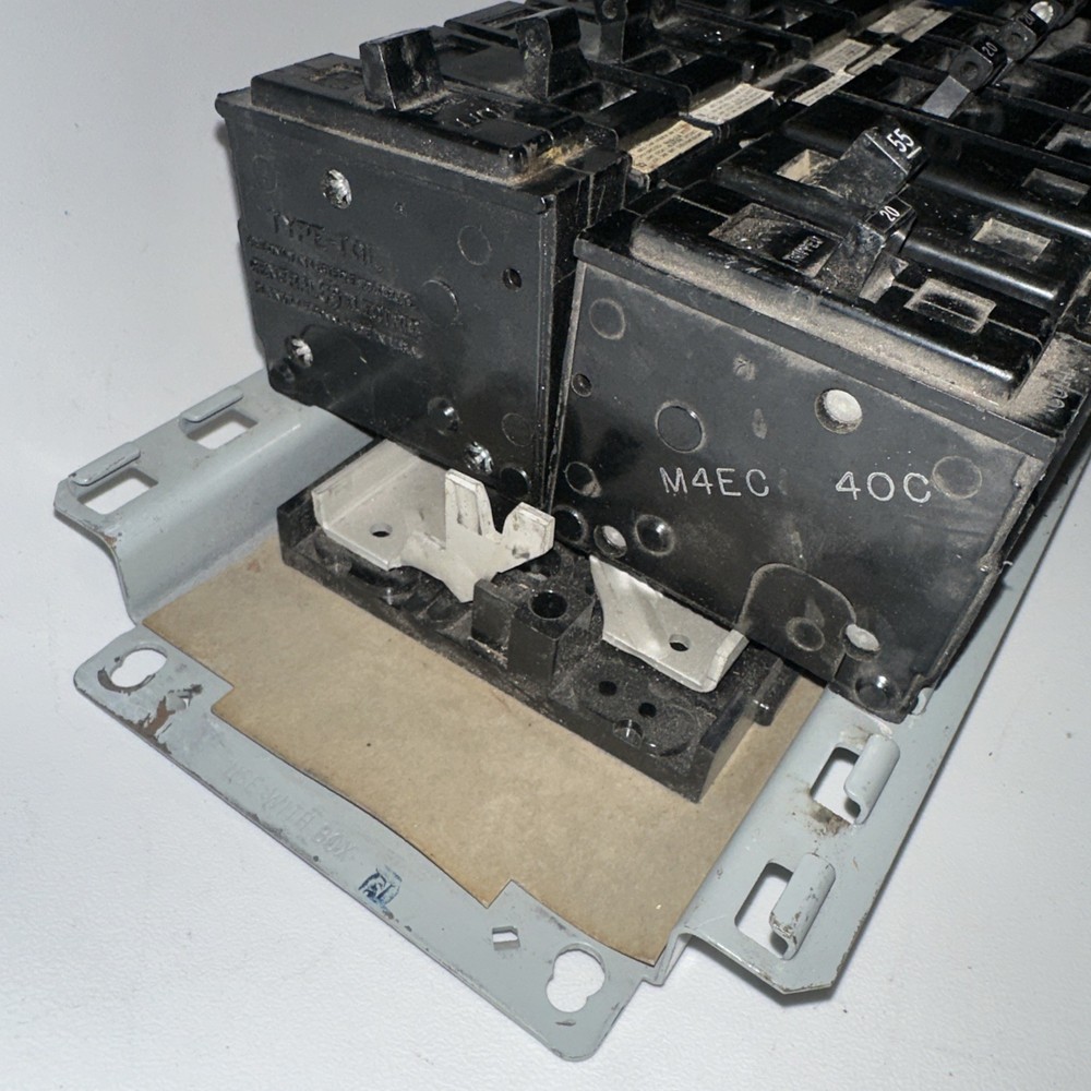 Electrical Load Center, service panel interior containing GE circuit breakers