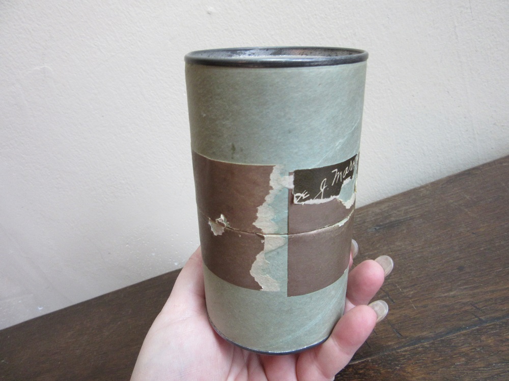 Old cardboard can with Joe J. Marx label