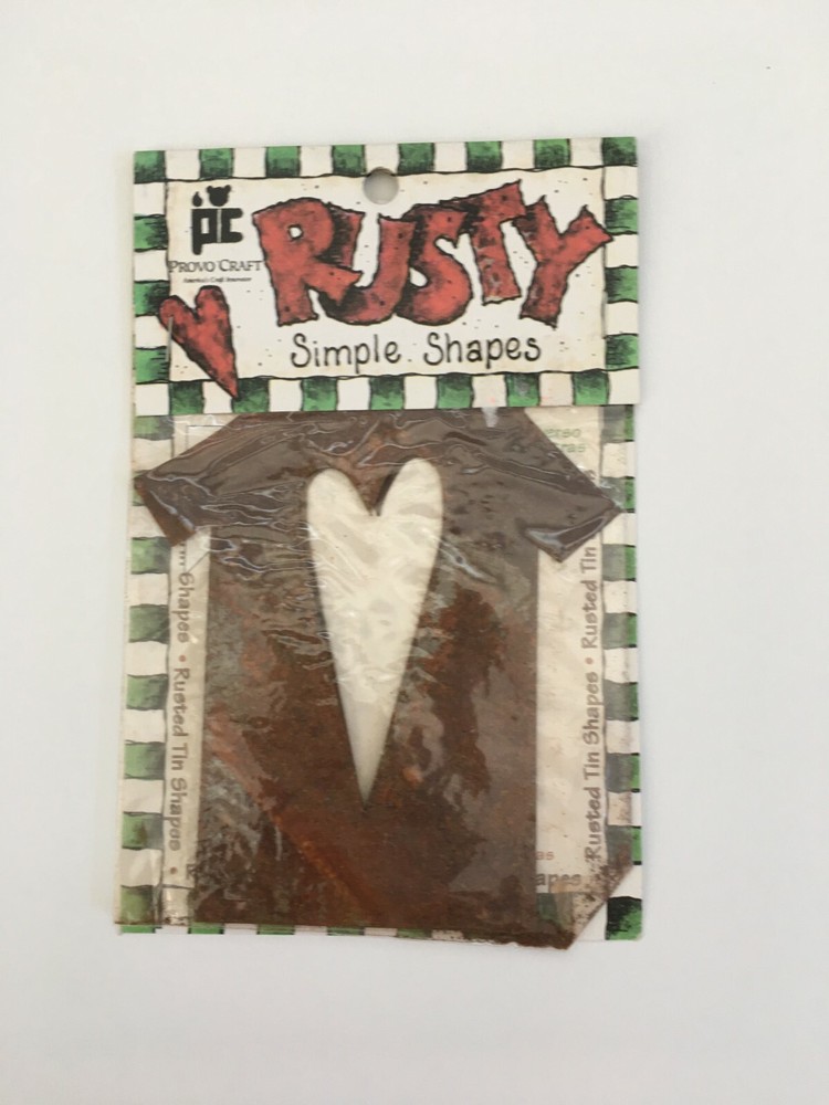 Rusty Tin House with Heart Cutout