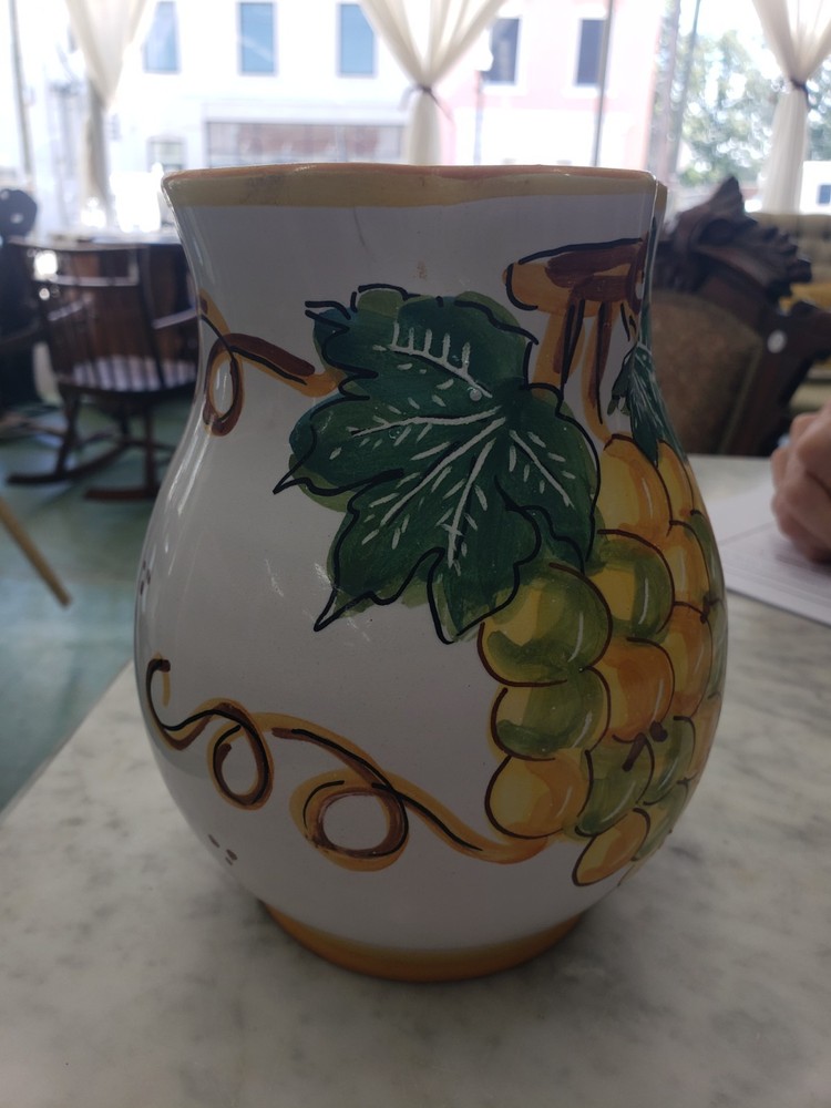 Hand painted, signed, ceramic pitcher,