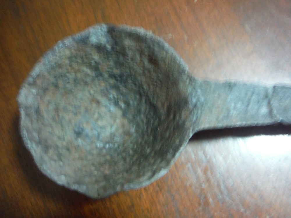vintage huge metal spoon