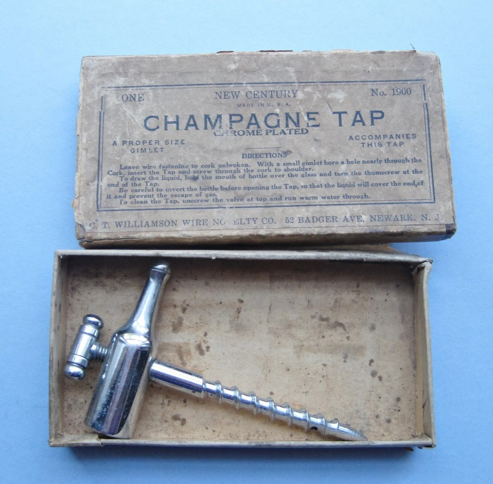 Three boxed champagne taps