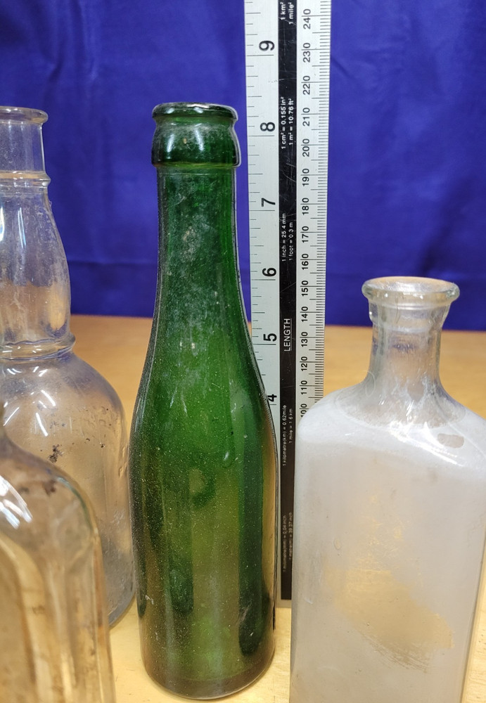 7 Vintage Bottles, 1 with Stopper