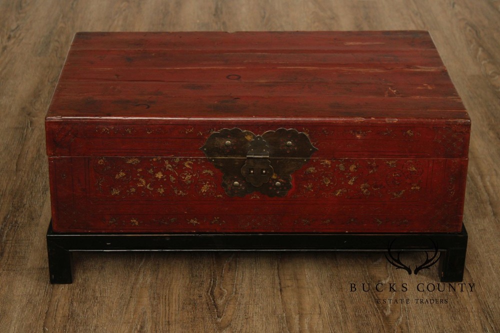 Red Lacquered Trunk With Brass Hardware On Custom Black Stand, Coffee Table
