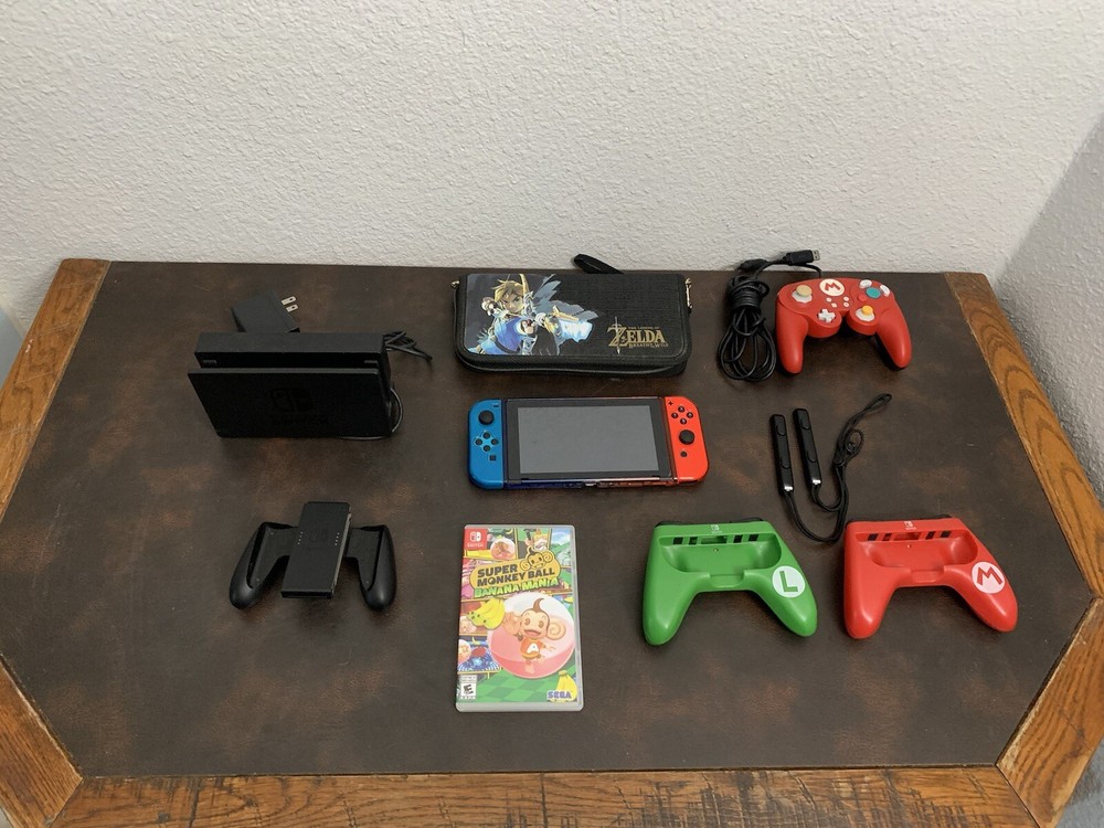 Nintendo Switch Console With A Bunch Of Stuff