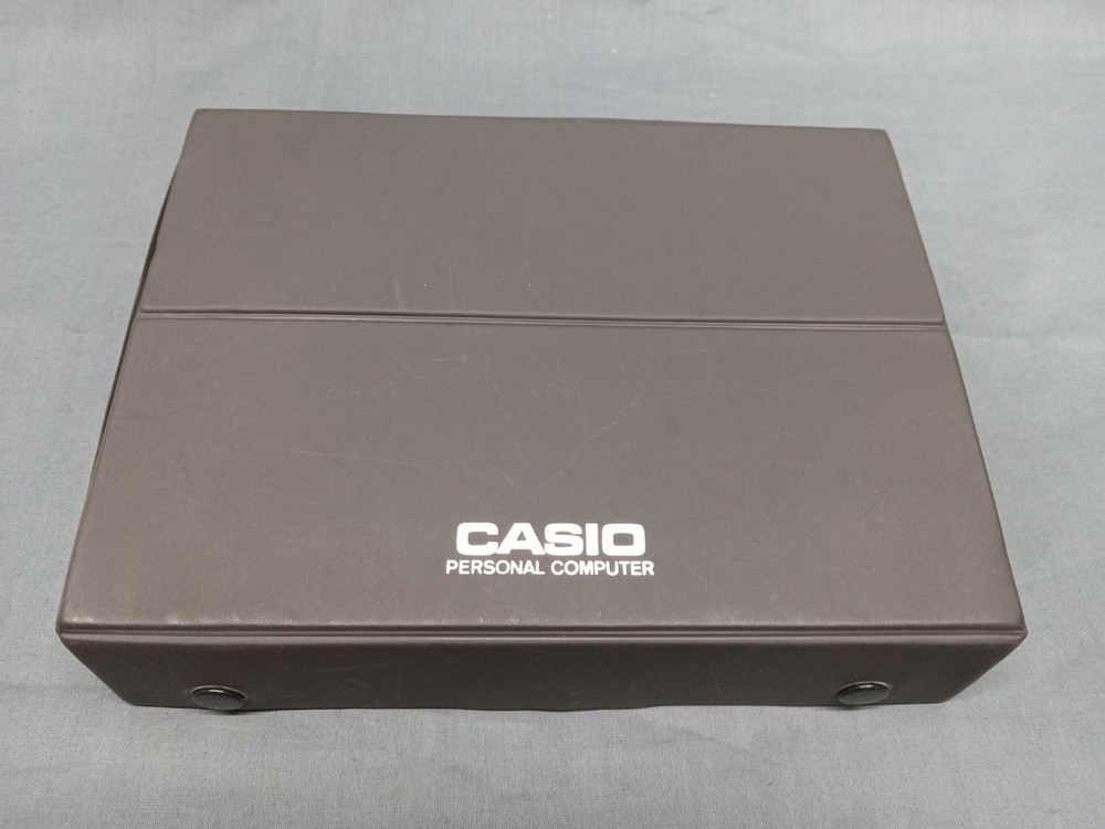 CASIO FX-820P Personal Computer With Charger Case and Manuals FULLY FUNCTIONAL!