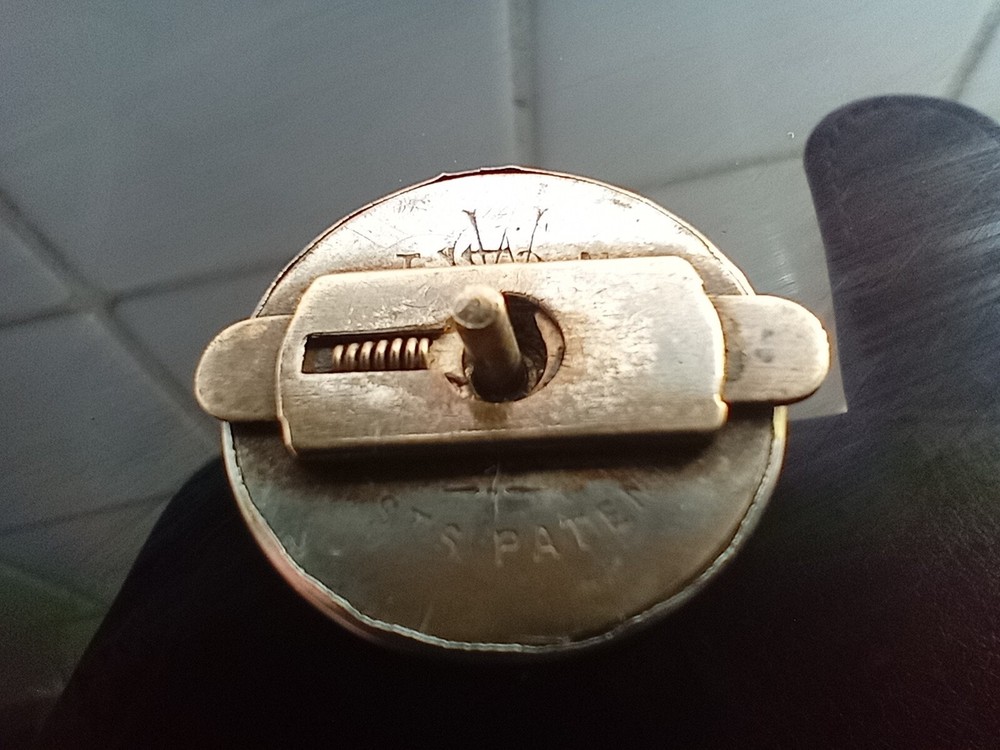 Ornate Victorian silver plated lapel badge