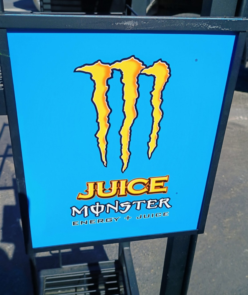 Monster Energy drinks display shelf on wheels that lock and with inserts