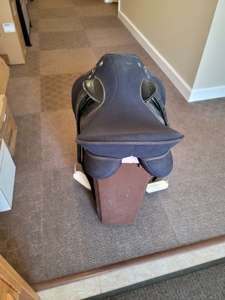 Wintec all purpose saddle with irons and girth strap