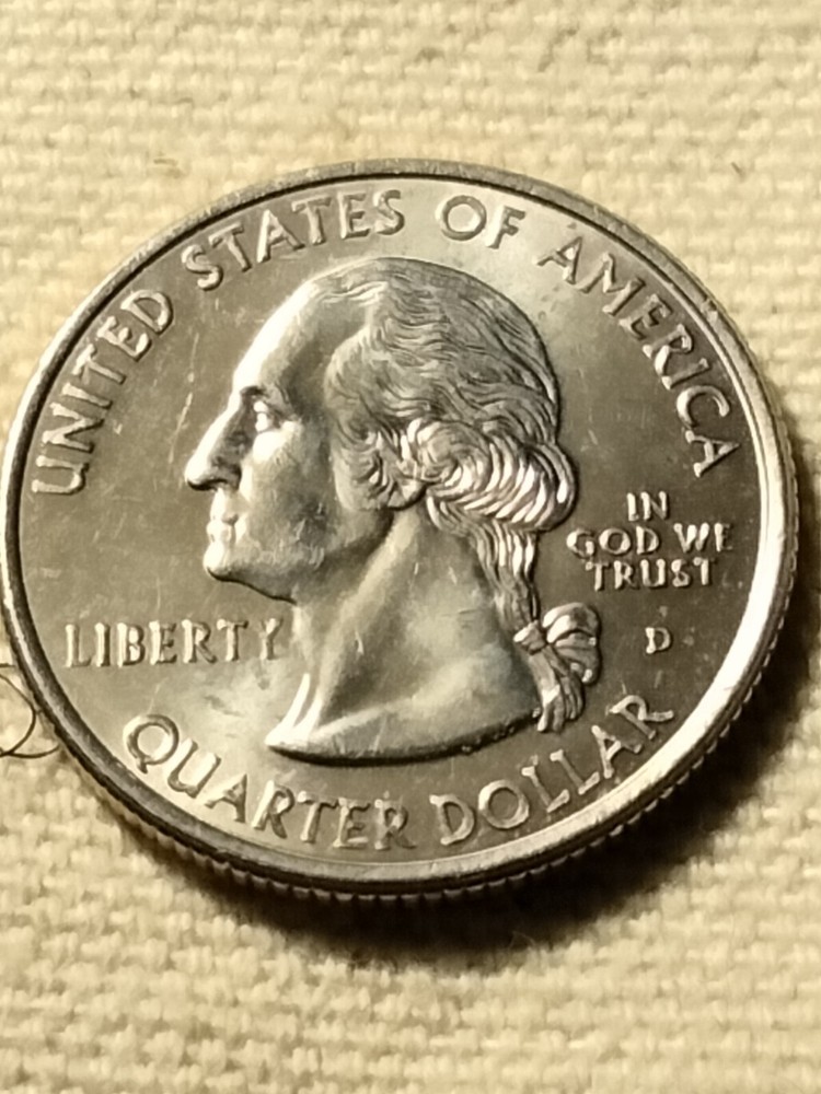 1999 D State Quarter Misaligned Die Struck Thru Grease