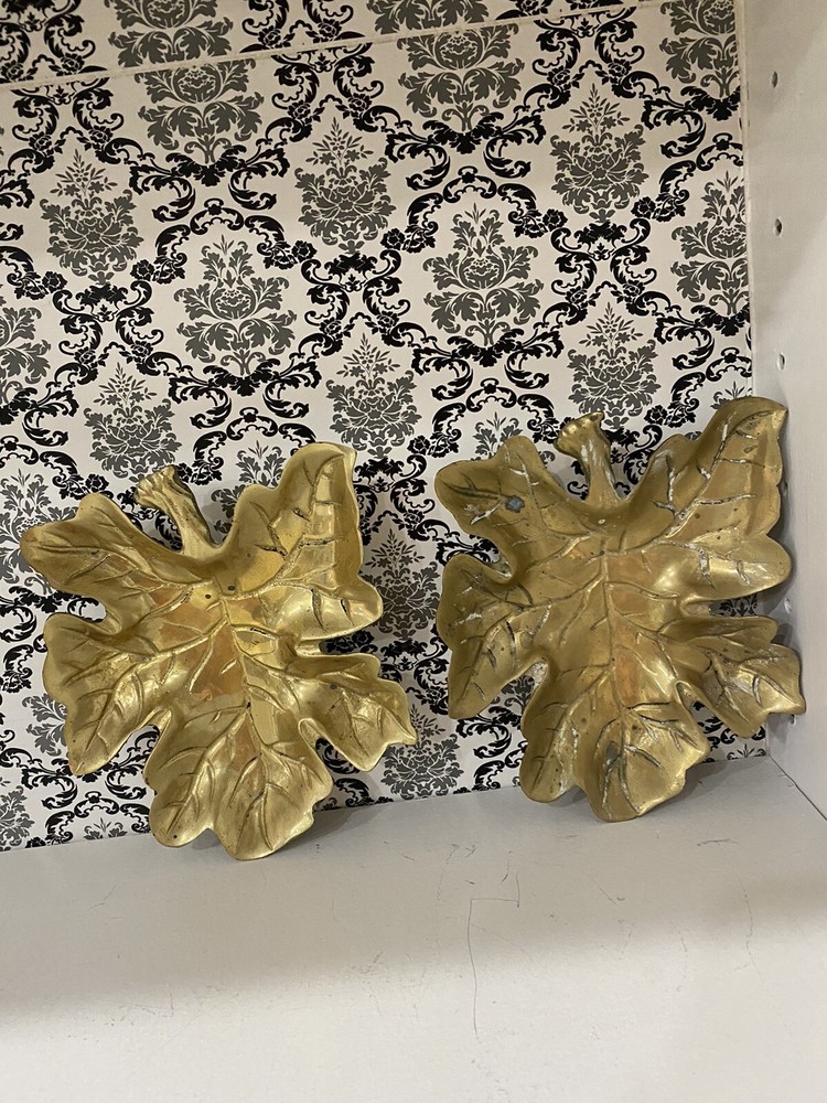 two beautiful solid brass leaf design wall decor. 7 inches tall.