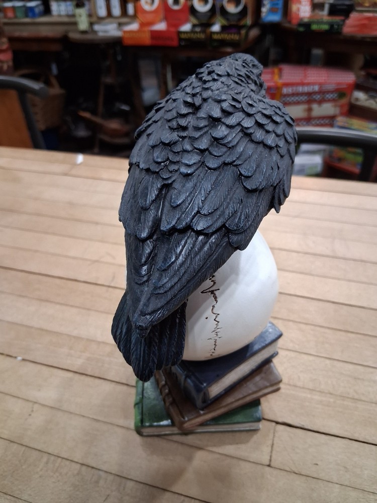 Raven Perched on Skull Gothic Book Stack Figurine