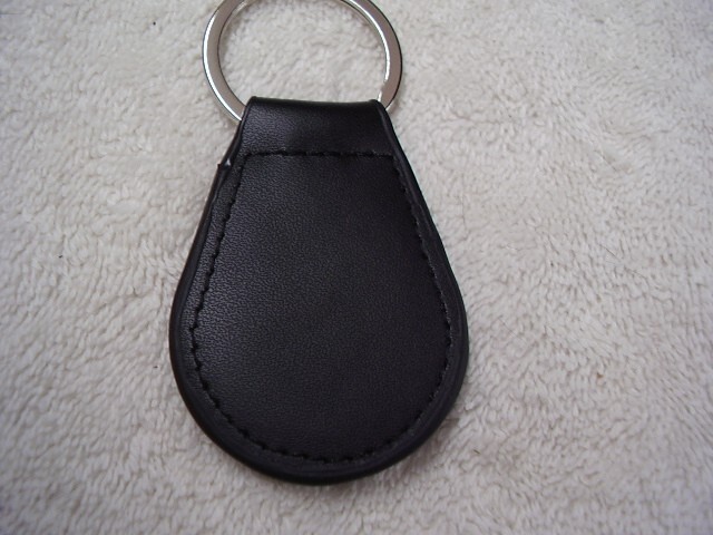 OLDSMOBILE RED ROCKET KEY CHAIN LEATHER FOB FREE POSTAGE