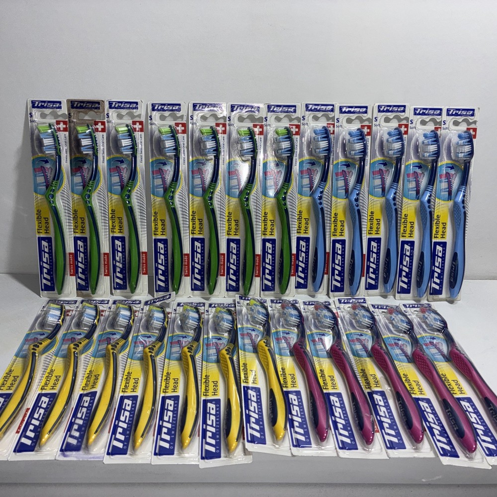 23 Trisa Flexible Head Toothbrushes/ All New