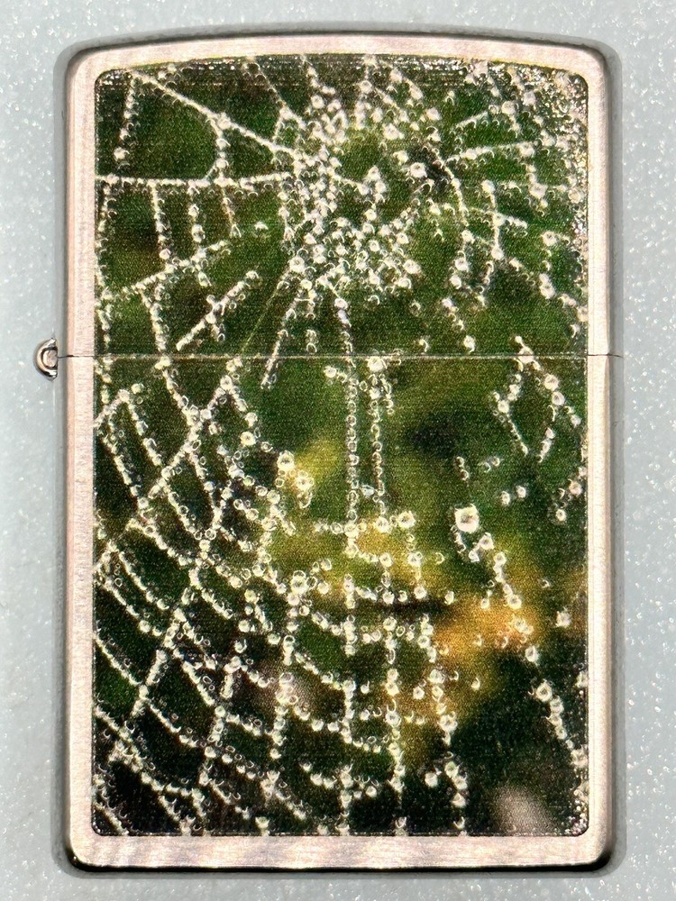 Vintage 2013 Spider Web Raindrop Chrome Zippo Lighter NEW