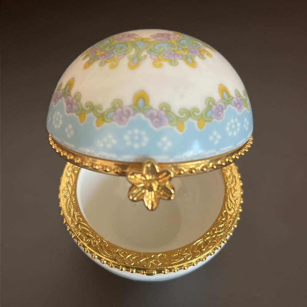 porcelain trinket box with brass clasp