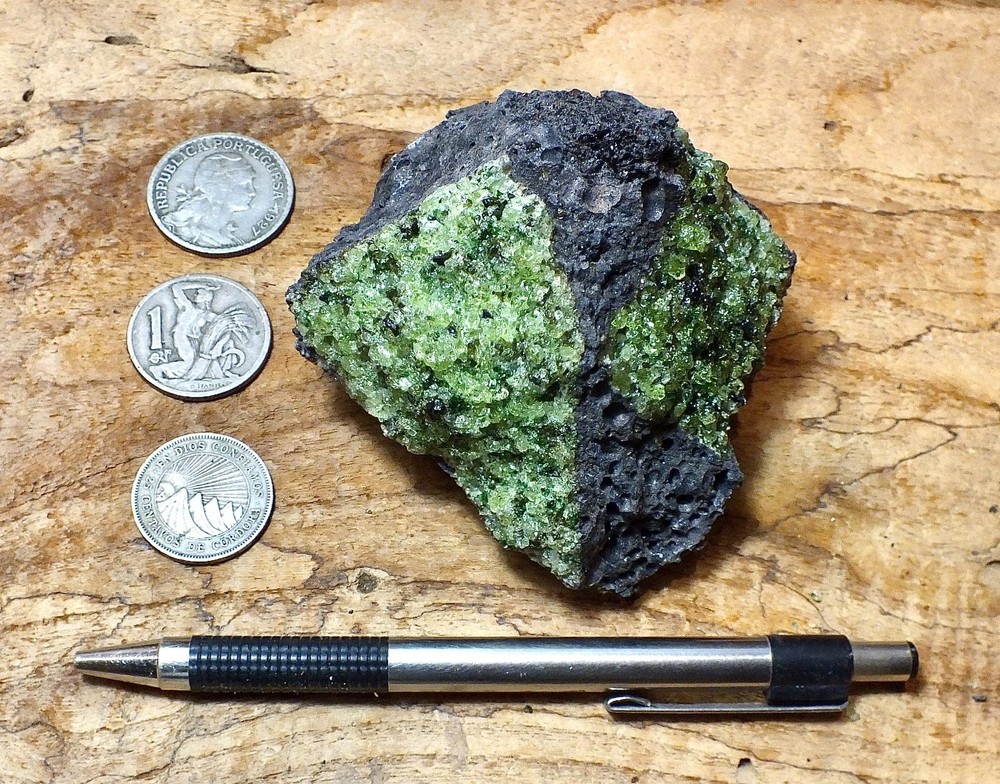 peridotite xenolith in vesicular phonotephrite - hand/display specimen