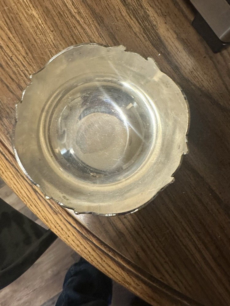 Set Of Four Silver Plated Cups.
