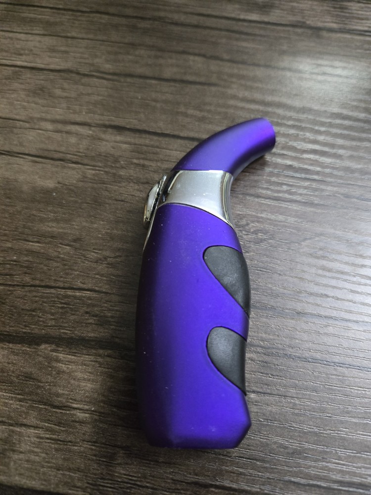 Angled Single Jet Cigar Lighter, Adjustable Flame And Has Fuel Window.