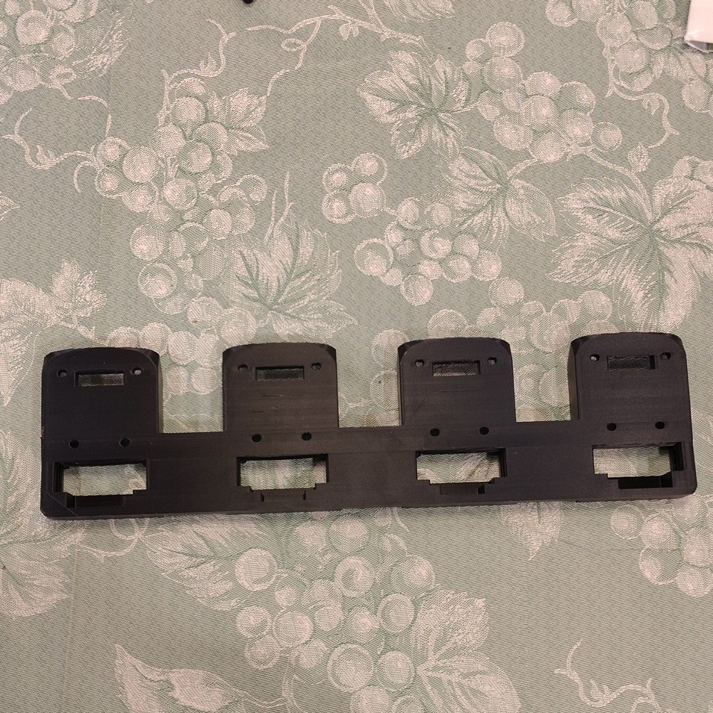 Black Dewalt battery holder, Wall Mountable