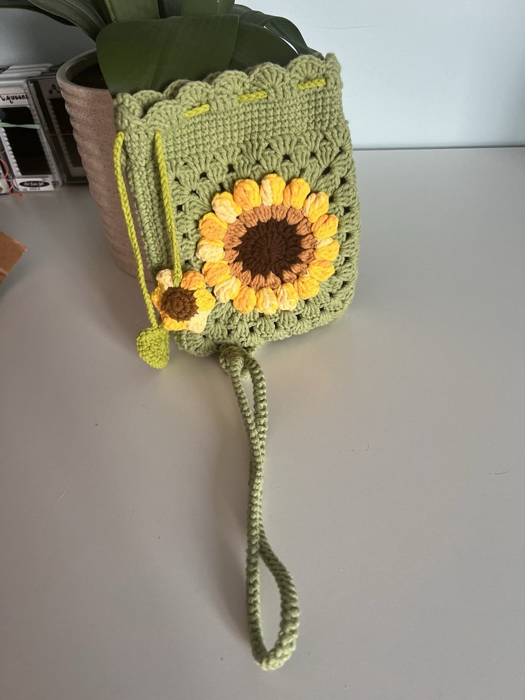 handmade crochet green  pouch with sunflower