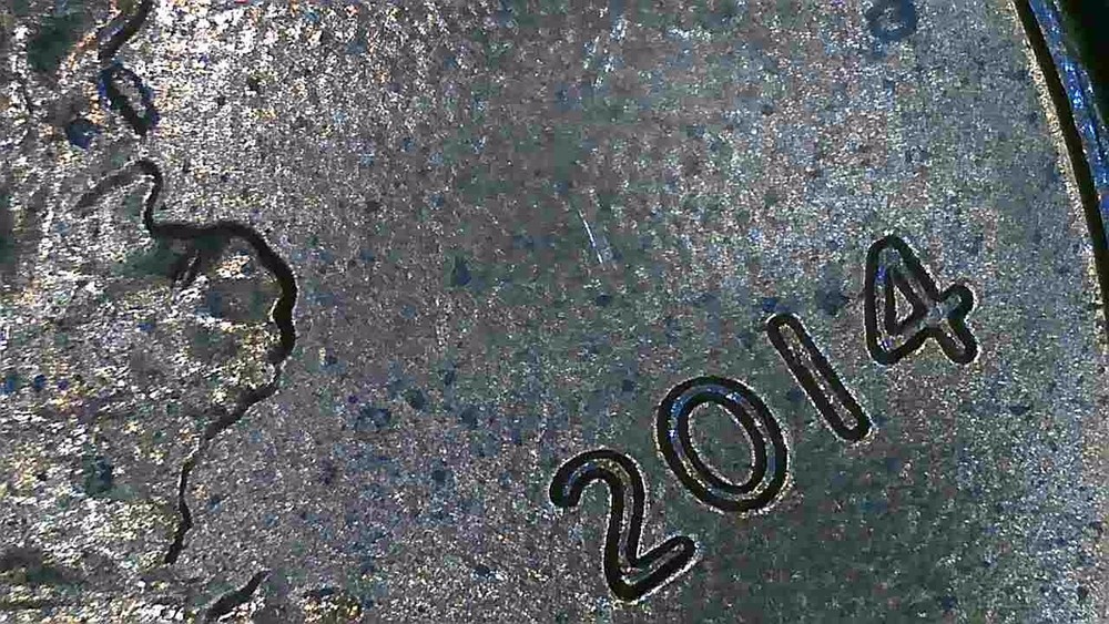 2014P penny with hitler mustaches.