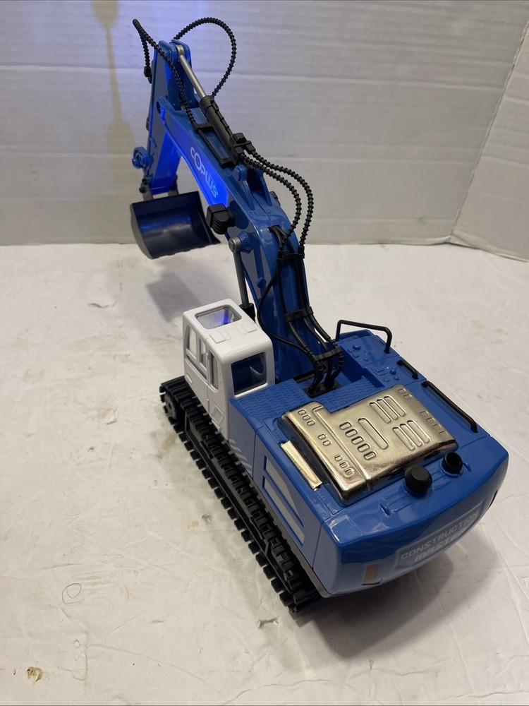 Coplus Remote Control Back Loader. Works great. No charger for tractor itself ￼