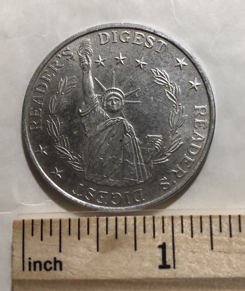 Reader's Diggest Aluminum Token