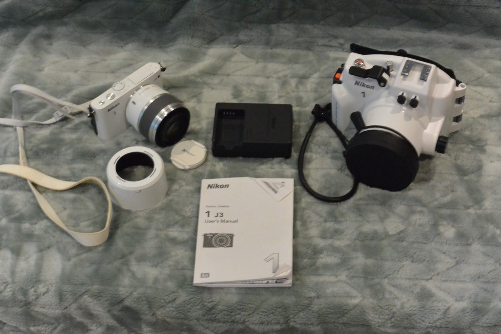 Nikon Package - Camera and waterproof housing.