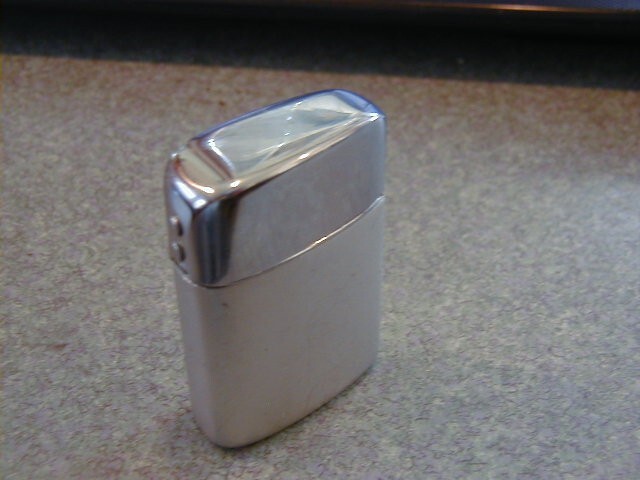 '' FIGMO '' LIGHTER LOOKS AND WORKS GOOD MADE BY RONSEN NOT RONSON