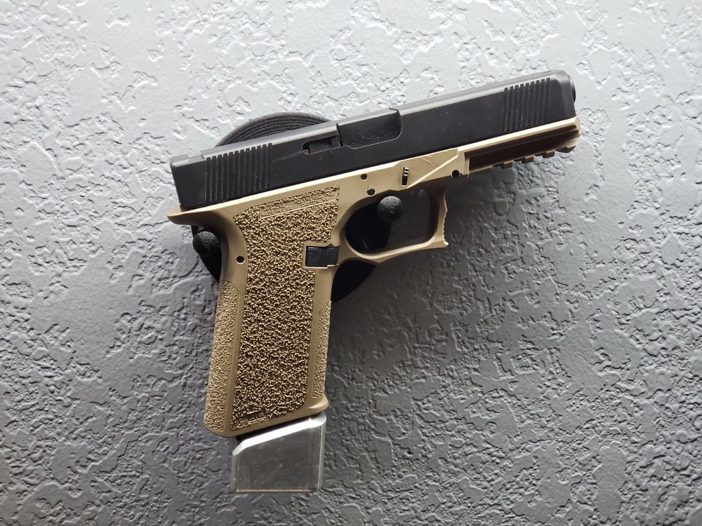 Pistol Wall Hanging Hook. Fits Almost Any Handgun
